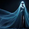 Săptămâna Haute Couture la Paris: O cioară vie, alge bioluminiscente și spectacol pe podium